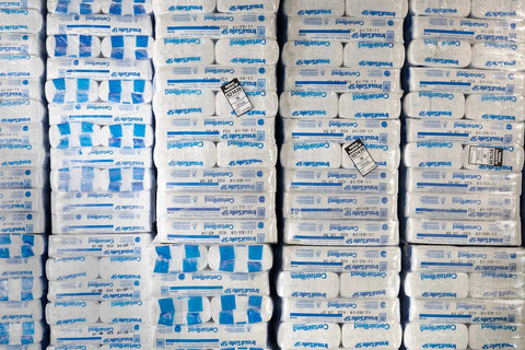 Straight Up Heavy Duty R30 Kraft Paper Faced Fiberglass Batt Insulation For 2x8 Floors And Attics Eight Large Bags stacked on pallets.