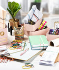 Office desk with supplies including dark green rubber bands size 33 3 1/2 in by 1/8 in 100 pack strong elastic bands.