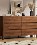 Totally Clutch Modern Dresser For Bedroom Featuring Spacious Walnut Drawers And Sleek Contemporary Design That Honestly Serves As A Big Time Room Upgrade, with horizontal drawers and decor items.