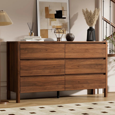 Totally Clutch Modern Dresser For Bedroom Featuring Spacious Walnut Drawers And Sleek Contemporary Design That Honestly Serves As A Big Time Room Upgrade, with horizontal drawers and decor items.