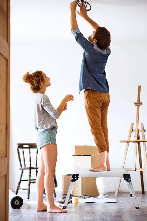 Couple using Heavy Duty Aluminum Work Platform Ladder, Foldable 30 x 12 x 20 Inch Platform, 330 Lb Capacity, for home tasks.