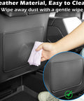 Custom Fit Seat Back Kick Protector And Rear Organizer For Tesla Model Y Model 3 Model S And X being cleaned with cloth.