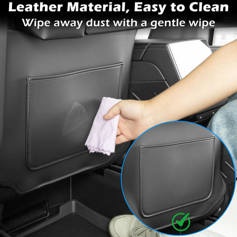 Custom Fit Seat Back Kick Protector And Rear Organizer For Tesla Model Y Model 3 Model S And X being cleaned with cloth.