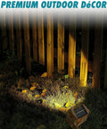 Solar Rock Lights For Garden Pathways Four Pack illuminating fence, solar spotlight, realistic stone look, outdoor yard use