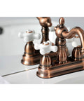 Antique Copper 4-Inch Centerset Bathroom Faucet In Solid Brass With Durable Washerless Cartridge, Deck Mount 3-Hole Installation, 1.2 GPM Flow At 60 PSI, Classic Heritage Style For Timeless Bathroom Glam reflected in a mirror.