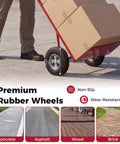 Heavy Duty Metal Hand Truck With 600 Pound Capacity And Ergonomic P Handle, shuffling boxes on stable 10" rubber wheels.