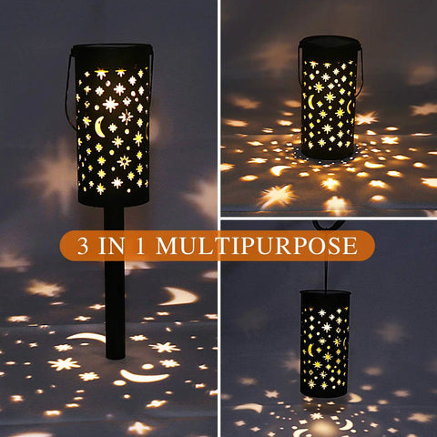 Six Pack Solar Outdoor Lights For Garden Pathway And Patio Bronze Lanterns With Moon And Star Designs illuminating at night.