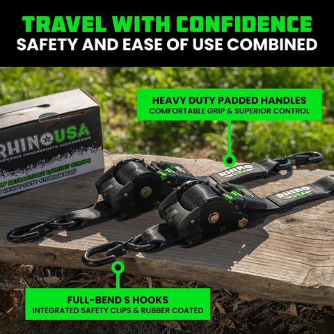 Beefy Heavy Duty Self Retracting Ratchet Straps 2 Inch By 10 Feet With 3033 Pound Break Strength on wooden surface