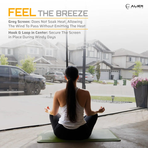 Woman practicing yoga indoors with view of neighborhood through Keep It Breezy With This Hands Free Magnetic Garage Door Screen 9x8 Ft.