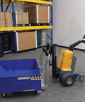 Heavy Duty Electric Powered Tugger With 1000 Lb Pull Capacity For Effortless Factory Material Handling in use with blue bin.