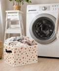 Chill Out The Clutter With These Adorable Dog Paw Print Foldable Storage Bins Featuring Heavy Duty Handles For Versatile Closet Nursery Organization And Everyday Household Essentials filled with laundry next to a washing machine.