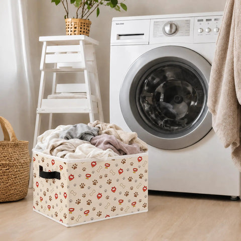 Chill Out The Clutter With These Adorable Dog Paw Print Foldable Storage Bins Featuring Heavy Duty Handles For Versatile Closet Nursery Organization And Everyday Household Essentials filled with laundry next to a washing machine.