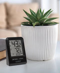 Battery Operated Wireless Digital Thermometer For Indoor Outdoor Temperature With 24 Hour High Low Records No Backlight Monochrome Display Hassle Free Setup 12 24 Hour Time Mode Signal Strength And Low Battery Alerts Built For Everyday Home Use on desk