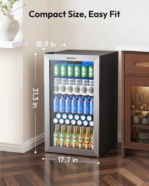 Mini Bev Fridge 130 Can Capacity Glass Door Cooler For Home Bar Office With Digital Temperature Control And Adjustable Shelves 3.2 Cu Ft Portable Compact Beverage Refrigerator Silver in a kitchen setting.