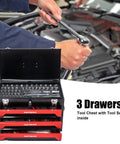 Mechanic using a wrench beside a heavy duty steel tool box with three drawers and ball bearing slides portable tool chest organizer lockable powder coated garage workshop storage cabinet for all your repair tools.