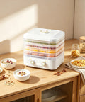 Big Time 6 Tray Food Dehydrator For Home With Clear Racks And Digital Temperature Timer Controls To Knock Out Homemade Jerky Dried Fruit Veggies And Dog Treats Quick As Can Be on kitchen counter with snacks.