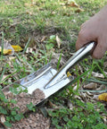 Using Stainless Steel Garden Trowel Hand Shovel for planting, small spade tool digging soil in garden bed