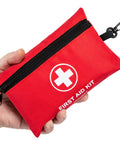 Front view of red mini first aid kit pouch with black zipper and carabiner clip