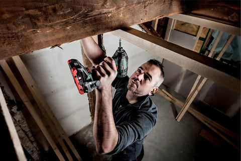 Person using Cordless Impact Driver With One Quarter Inch Hex Drive, 200 Nm Torque, Brushless Motor For Beast Mode Speed And Efficiency in tight space