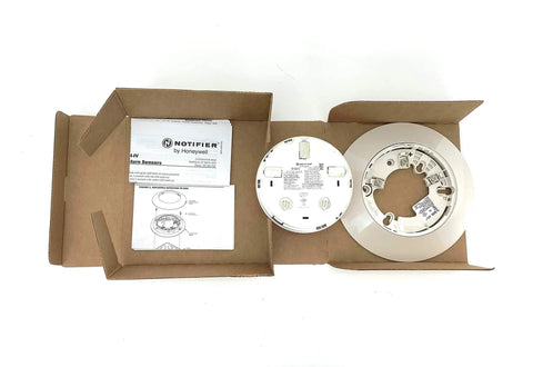 Top Shelf Commercial Grade Heat Detector With Base Included For Knockout Fire Safety setup with manual in cardboard packaging.