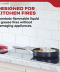 Kitchen fire extinguisher for home use beside stovetop, combats grease fires, easy pull pin, lightweight aluminum, flared nozzle