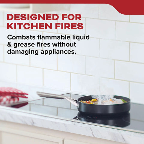 Kitchen fire extinguisher for home use beside stovetop, combats grease fires, easy pull pin, lightweight aluminum, flared nozzle