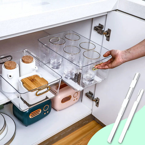 No Sweat Self Adhesive Drawer Slides Four Pack Slick Pull Out Cabinet Glides For Dresser Wardrobe And Home Office Setup With Heavy Duty Stick On Tape For Quick Diy Fix, showcasing glasses in a clear drawer organizer.