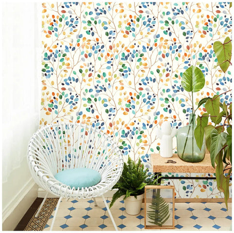 Peel And Stick Floral Wallpaper For Nursery Decor Removable Contact Paper In Colorful Forest Beige Orange Blue No Mess Easy Renters Friendly Room Makeover 17.7 Inch By 118 Inch on living room wall, with chair and plants.