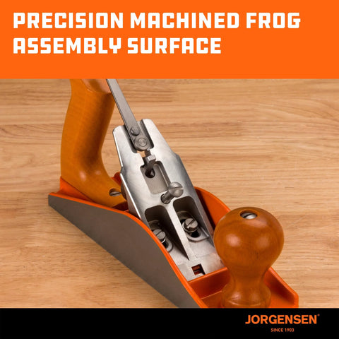 JORGENSEN No.4 smoothing hand plane with orange body and wooden handle, side view on wooden workbench