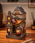 Cherry Blossom Sakura Train Book Nook Kit With LED 3D Wood Puzzle And Infinity Mirror on desk, featuring a detailed train scene.