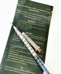 0.7ml Silver Conductive Paste Pen For PCB Repair with two needle sizes displayed on instruction sheet for electronics repair