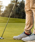 Golfer standing on green with putter highlighting 0.52 Inch Golf Club Shaft Extension Stick Extender For Wood Putters Pro Grade Build Game Changer