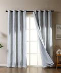Blackout Curtains For Bedroom And Living Room With Thermal Insulation And Room Darkening, Jacquard 180 GSM Window Curtain Panels, Light Gray, 42 By 63 Inches, Enhances Privacy And Energy Savings hanging in a living room.