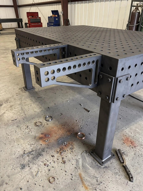 Built Tough 12 Inch Welding Clamping Square And Table Extension Kit featuring heavy-duty clamping fixtures on modular fixture table.