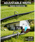 Landscape staple securing a hose on grass, demonstrating use of 120 Pack Landscape Staples 6 Inch 11 Gauge Galvanized Ground Anchors For Landscaping Fabric Tarps And Netting Heavy Duty Garden Stakes For Lawn Edging Weed Barrier And Outdoor Projects.