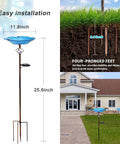 Dimensions of Solar Glass Blue Bird Bath On Metal Stake With White LED Light, four-pronged feet and installed in garden view
