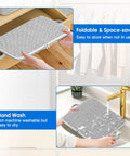 Straight Up Game Changing Foldable Storage Bags 4 Pack With Sturdy Handles in grey, hand wash in sink, demonstrating easy storage.