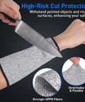 Real Deal Cut Resistant Arm Sleeves For Mechanics And Gardeners With Snug Stretch Fit Anti Puncture Forearm Guards That Make The Daily Grind A Total Breeze In Black Gray demonstrating high-risk cut protection with knife.
