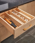Kitchen drawer with installed Ten Pack Natural Beech Wood Cabinet Pulls Handles for cabinets and drawers, smooth surface.