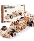 1 To 18 Scale Formula Racing Car Puzzle Kit For Adults, Wind Up Wooden Model Car Kit displayed with packaging