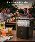 No Sweat Countertop Nugget Ice Maker With Easy Grip Handle Produces Up To 38 Pounds Of Chewable Ice Daily on wooden table with drinks.
