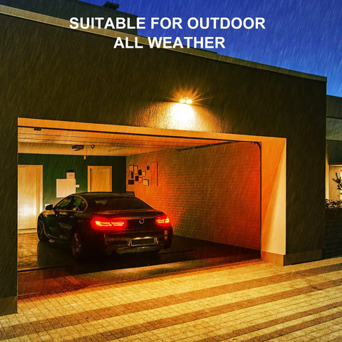 Outdoor Motion Sensor Flood Light Bulbs for Driveways and Yards PAR38 3000K illuminating garage at night in rain