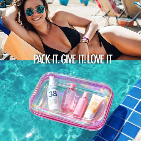 Kickass Clear Hard Shell Zipper Cases 2 Pack Iridescent Finish with toiletries by a pool side.