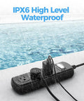 Weatherproof Outdoor Power Strip Workhorse With IPX6 Waterproof Rating Three Wide Outlets by a Pool in Rain