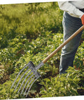 Gardener using Workhorse Garden Plowing Fork Replacement Head For Soil Loosening And Manure Turning Steel Multi Tooth Rake Head Fits Wood Handle
