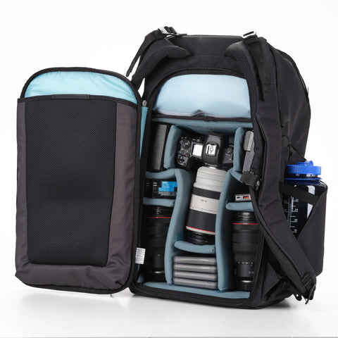 Urban Explore 30L Camera Backpack For Travel And Everyday Photography with open compartment showing gear storage layout.