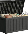 All Weather Outdoor Storage Box Bench, 150 Gallon Lockable And Waterproof Storage Chest containing cushions and garden tools