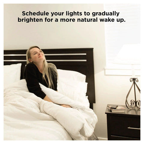 Person waking up in bed with Zigbee A19 Daylight LED Light Bulbs, 8 Pack, 60W Equivalent, Hub Required lighting.