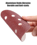 Hand holding 110 Pack 5 Inch 8 Hole Sanding Discs Set With Hook And Loop Aluminum Oxide Pads, curved to show flexibility.