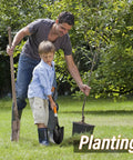 Father and son using All Around Mini Garden Shovel 28 Inch D Handle Kid Friendly Beach And Garden Tool for planting tree.